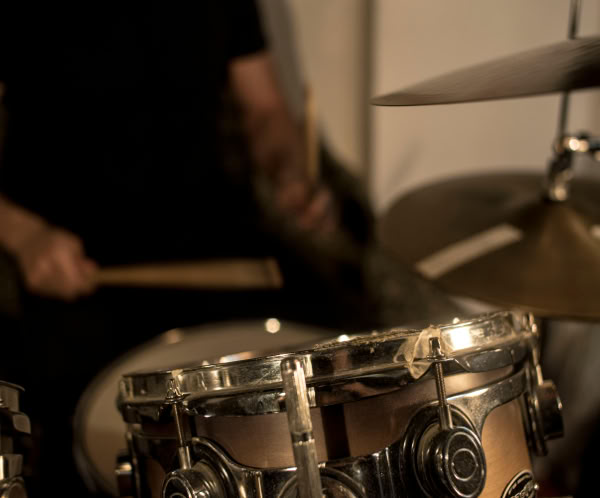 Person Playing Drums